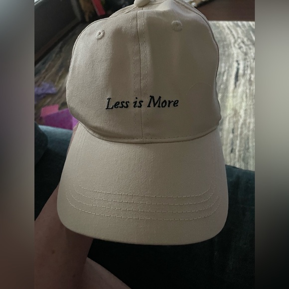 Merit Accessories - “LESS IS MORE” Cream Baseball Cap with Embroidered Text NWT